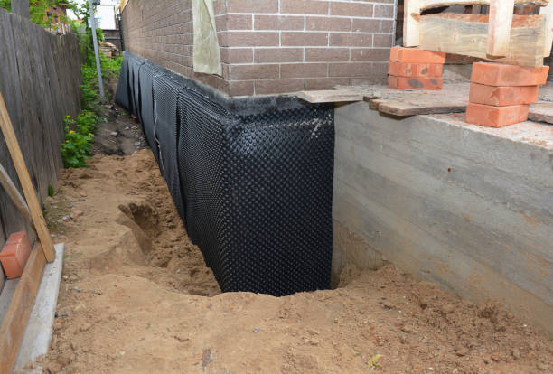 Happy homeowners after waterproofing job in Axis